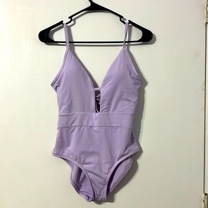 BECCA one piece swimsuit.